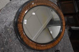 An early 20th Century oval wall mirror, approx. 83 x 57cm