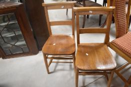 A set of four traditional chapel chairs (not hymn book back type)