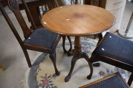 A late 19th or early 20th Century mahogany pedestal table having turned column and triple splay legs