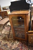 A Victorian walnut and inlaid music cabinet having lined and labelled shelves, dimensions approx.