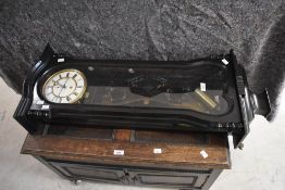 A 19th Century ebonised wall clock having enamelled dial