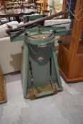 A vintage Morso mitre machine, with attachments