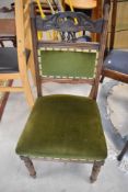 A Victorian stained frame dining chair having later green dralon upholstery to overstuffed seat