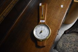 A vintage barometer of small proportions the dial named for Shortland (SB)