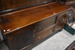 An early 20th Century oak dresser, dimensions approx. W166 H183 D54cm