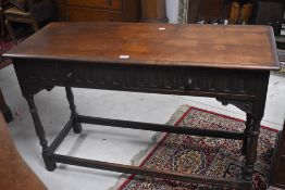 A priory style oak side or hall table, width approx. 122cm