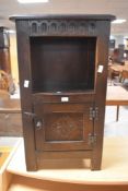 A reproduction oak bedside cabinet , width approx. 40cm