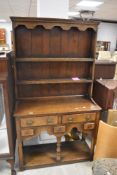 A nice quality reproduction oak dresser , maybe Titchmarsh and Goodwin, of small proportions,