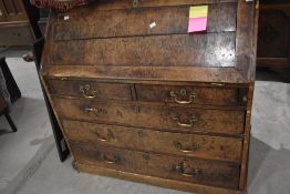 An 18th Century walnut bureau of traditional design with fall front over 2/3 drawers 105 x 105 x