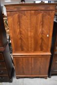 A reproduction cocktail cabinet , dimensions approx. H139 W71cm