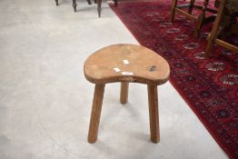 An Arts and Crafts (Yorkshire oak Robert 'Mouseman' Thompson) jointed oak three legged kidney