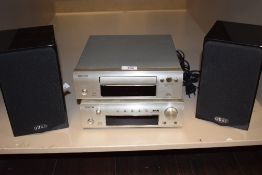 A Denon mini Hi-Fi System including a DCD-F102 CD player and DRA-F102DAB stereo receiver sold