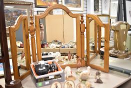 A freestanding pine triptych dressing table mirror 62cm x 113cm.