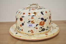 A Wedgwood Etruria Japan cheese dome. Very pretty item suffering from two chips to base.