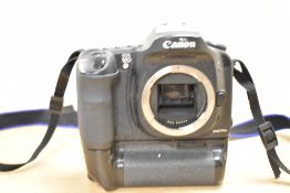 Canon EOS 10D (body only) a 6.3MP DSLR, EF mount. Includes a battery grip with two batteries.