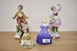 A Royal Doulton bone china figurine 'Marie' HN 1370 sold together with three Capo Di-Monte