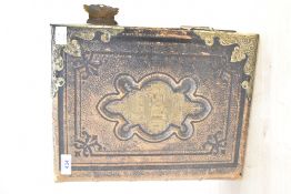 A large leather bound copy of the Holy Bible including an illustrative history of the Old and New