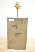 A modernistic stoneware lamp having brick design. If you like Pink Floyd this is a must! 38cm x 15cm