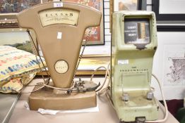 An Avery class C weighing machine, h46cm, sold together with an Avery Shadoweight weighting