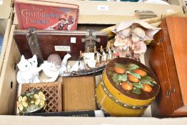 A wooden cylindrical trinket box with painted lid, tw2o smaller wooden boxes and a bigger pine