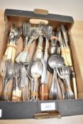A selection of flatware to include forks, spoons, butter knives and fish cutlery etc.