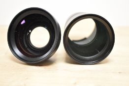 Three Canon lens accessories. A Canon Tele-Converter TC-DC58B 1.5x, a Canon Conversion Lens