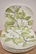 A set of 6 1950s Red Wing plates of oval form, decorated with floral patterns on a magnolia