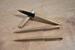 A boxed Parker 61 converter fill fountain pen ballpoint pen and propelling pencil set in 9ct gold