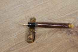A Parker Moderne button fill fountain pen in Brown with single narrow band to the cap having