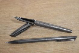 A Waterman CF fountain pen and ballpoint pen in hallmarked silver. The ballpoint is spares and