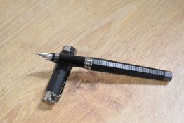 A boxed Montegrappa Nero Uno cartridge fill fountain pen in Black, this multi-faceted pen having