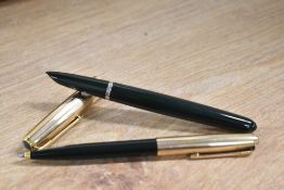 A boxed Parker 51 aerometric fill fountain pen and ballpoint pen in Forrest Green with Rolled Gold