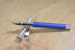 A Graf Von Faber-Castell Guilloche converter fill fountain pen in Indigo Blue with hinged clip