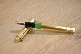 A boxed Pelikan M760 (150 Anniversary) piston fill fountain pen in gold barleycorn having Pelikan