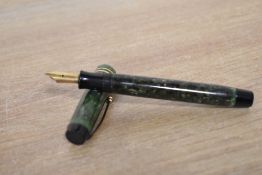 A Parker Duofold button fill fountain pen in Jade Green with two narrow cap bands having Parker