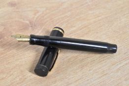A Parker Duofold Senior button fill fountain pen in Black with single wide cap band Parker Duofold