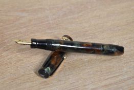 A Mabie Todd & Co Swan Visofil fountain pen in green/brown marble with broad filigree cap band