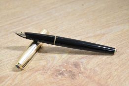 A Parker 65 Consort converter fill fountain pen in black (double jewelled) with rolled gold cap