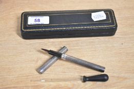 A boxed Mabie Todd & Co sterling silver eye dropper fountain pen complete with dropper