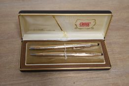 A boxed Cross Rolled Gold ballpoint pen and propelling pencil set