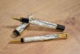 A boxed Parker Duofold Centennial converter fill fountain pen and ballpoint pen in Pearl and Black