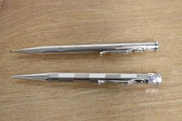 Two Yard o Led propelling pencils. One Rolled Silver and the other Rodium Plated