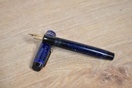 A Parker Duofold Junior button fill fountain pen in Lapis Lazuli Blue with two narrow bands to the