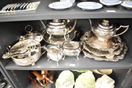 A large quantity of 20th-century metal and silver plated tableware, including a set of three
