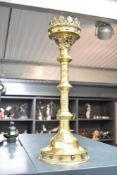 An attractive 20th century cast-brass pricket candlestick, having a shaped and pierced scalloped