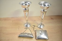 Four 20th-century white metal items, including a pair of Walker and Hall of Sheffield chamber sticks