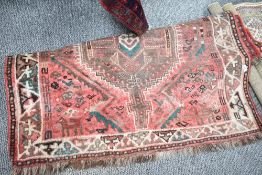 An attractive Heriz type woollen Persian rug, having a central double pole medallion to the abrashed
