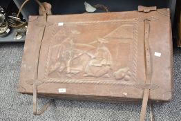 A large vintage leather travel trunk having an embossed motif to front titled 'ecuador', trunk