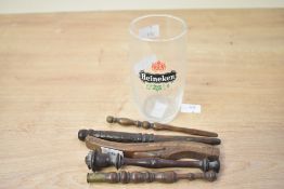 A selection of 19th to 20th century turned wooden spindle knitting sheafs, each of slender