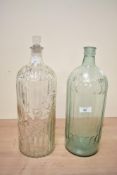 Two large Victorian apothecary poison bottles, both of cylindrical form, one fitted with original